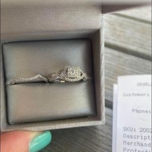 1/2 CT. T.W. Diamond Cluster Twist Shank Bridal Set in 10K White Gold